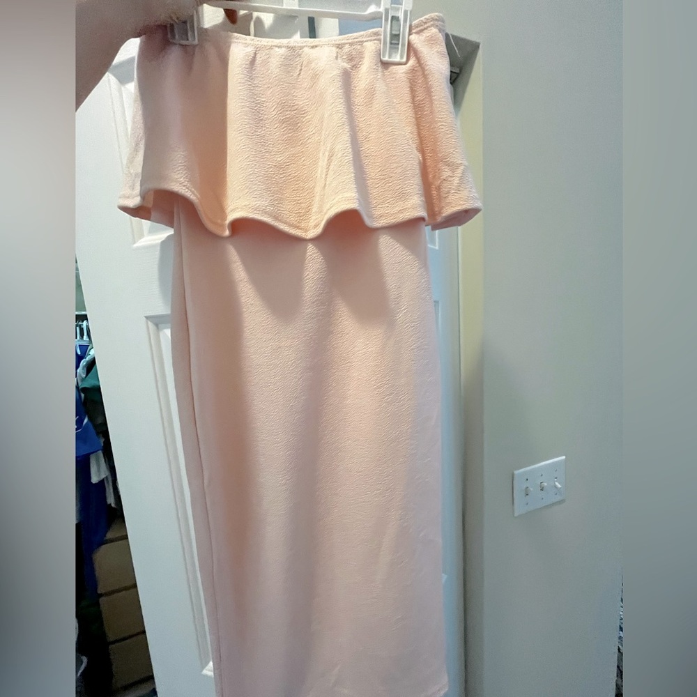 Pink strapless midi bodycon dress with ruffled top